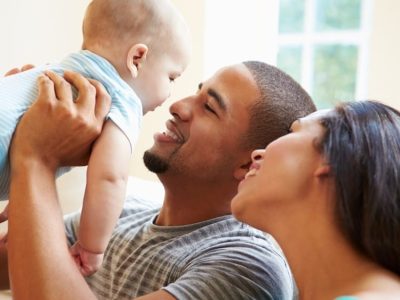 Mother, father, and baby together for Standard Trio Paternity DNA testing.